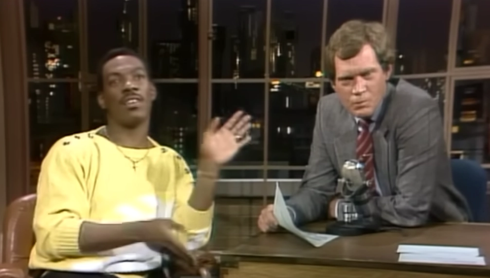 Eddie Murphy and David Letterman at the interview desk.